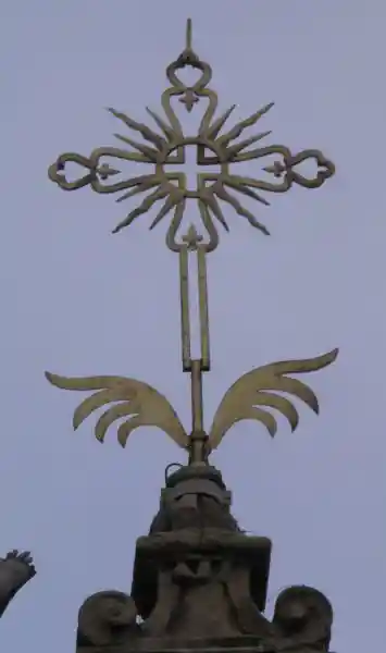 Steeple with Elevated Christian Solar Cross on top of Church